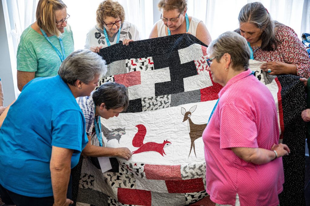 Quilting as a health based activity to promote social involvement, mental health stimulation and well being.
