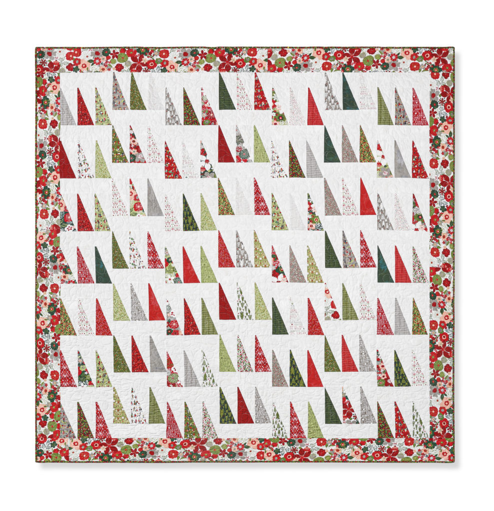 The Christmas Tree Farm quilt from the Missouri Star Quilt Co Triple Play featuring the all new Wing Template.